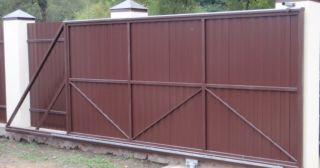 Купить откатные ворота из профнастила Соликамск, цена от 1738 руб.